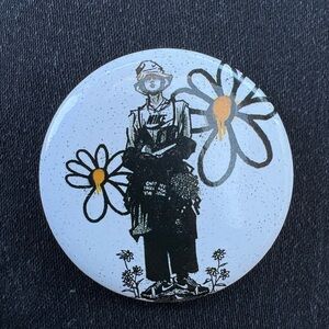 Vintage Nike Floral Art Pin with Black, White, and Orange Accents